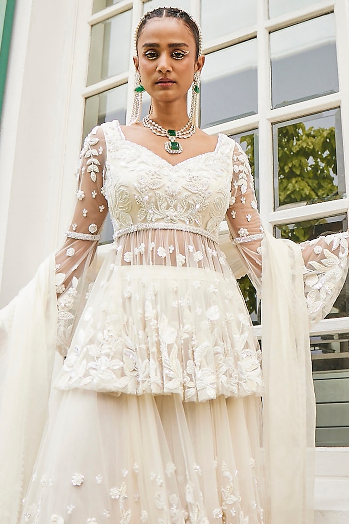 Ivory Crepe & Net Pearl Embroidered Double Layered Bridal Sharara Set by Mani Bhatia at Pernia's Pop Up Shop