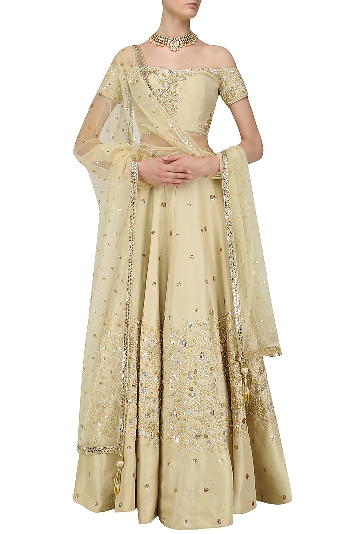 Gold and rose gold cutdana embroidered lehenga set available only at Pernia's Pop Up Shop.