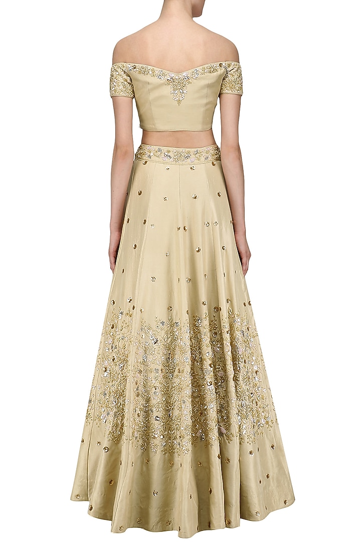 Gold and rose gold cutdana embroidered lehenga set available only at Pernia's Pop Up Shop.