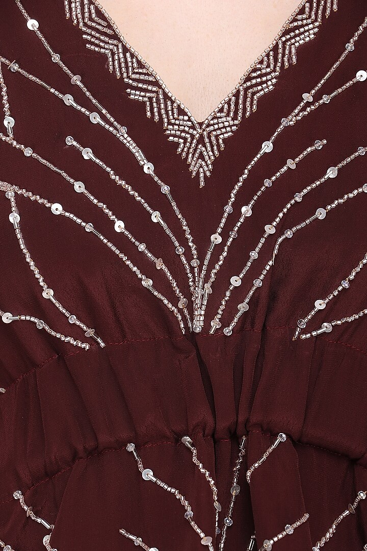 Deep marsala peplum top with drape skirt available only at Pernia's Pop Up Shop.