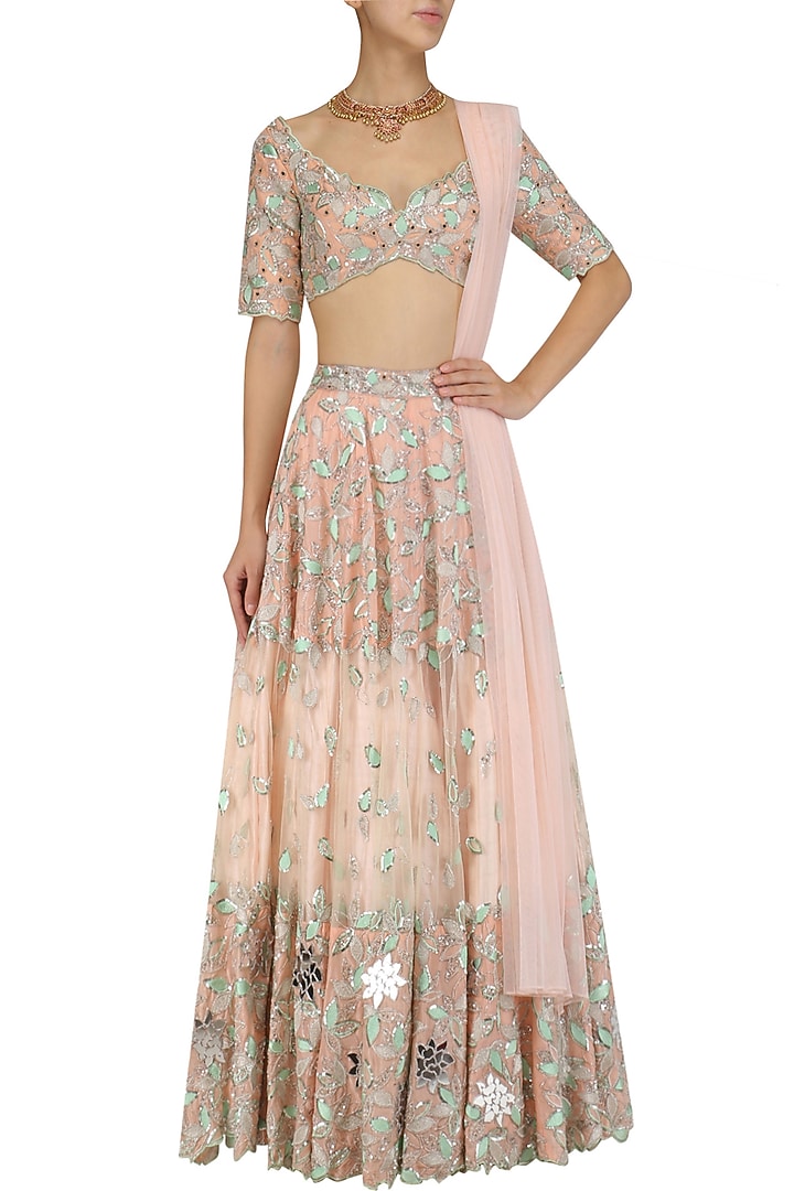 Peach and green resham embroidered lehenga set available only at Pernia's Pop Up Shop.