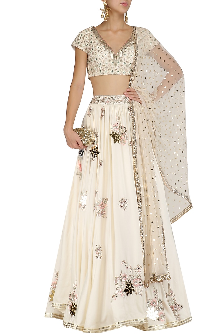Ivory mirror embroidered lehenga set available only at Pernia's Pop Up Shop.
