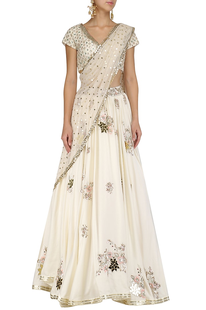 Ivory mirror embroidered lehenga set available only at Pernia's Pop Up Shop.