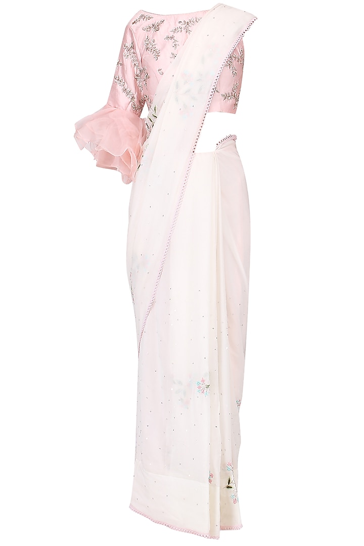 Ivory embroidered saree with pink blouse set by Mani Bhatia