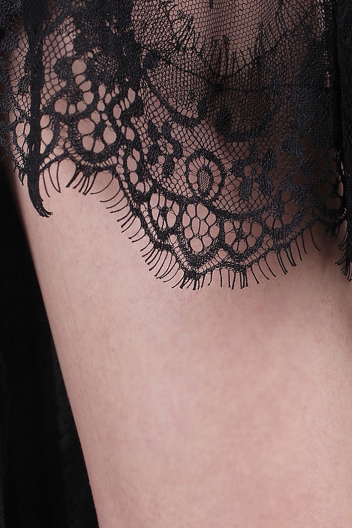 Black high low lace dress available only at Pernia's Pop Up Shop.