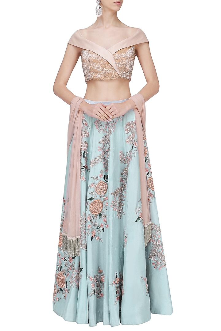 Teal blue and pink embroidered lehenga set available only at Pernia's Pop Up Shop.
