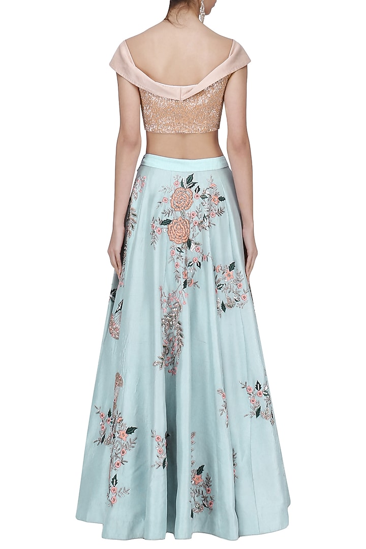 Teal blue and pink embroidered lehenga set available only at Pernia's Pop Up Shop.