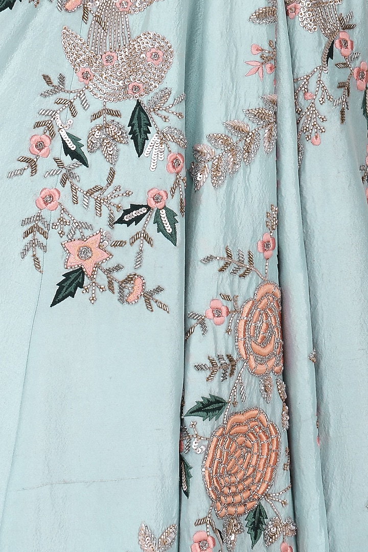 Teal blue and pink embroidered lehenga set available only at Pernia's Pop Up Shop.