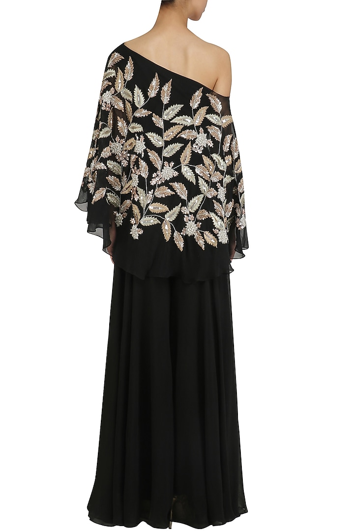 Black leaf embroidered one shoulder cape with palazzo pants available only at Pernia's Pop Up Shop.