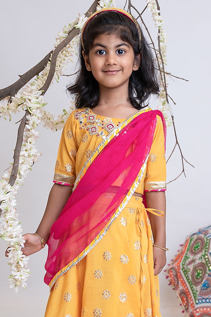 Saffron Organic Cotton Mirror Hand Embroidered Banarasi Lehenga Set For Girls by Mi Dulce An'ya at Pernia's Pop Up Shop