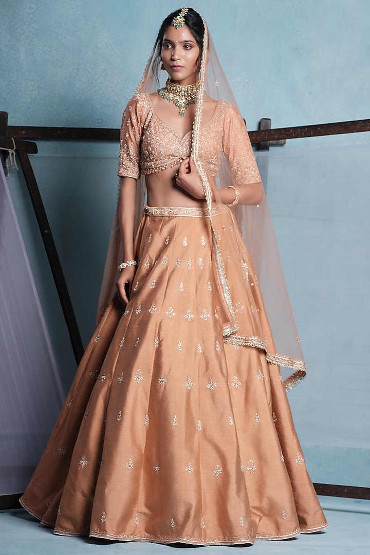 Nude Blush Dupion Hand Embroidered Wedding Lehenga Set by Muditaa By Urmila at Pernia's Pop Up Shop