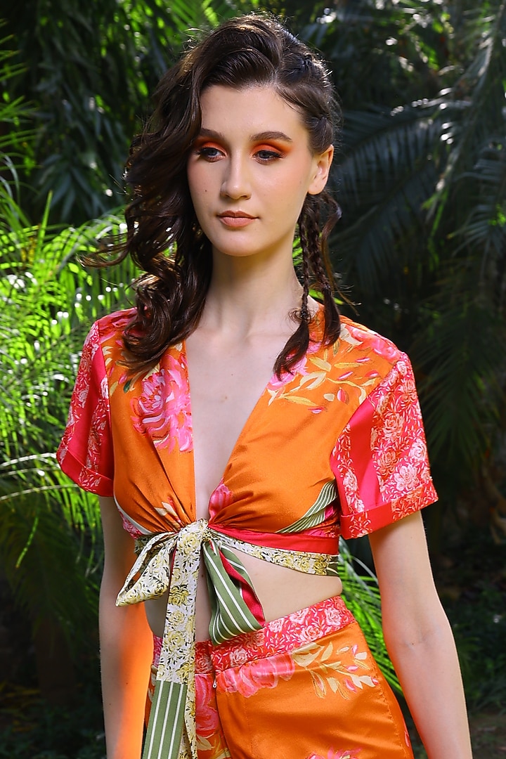 Orange Printed Satin Tie-Up Blouse by Mynah Designs By Reynu Tandon at Pernia's Pop Up Shop