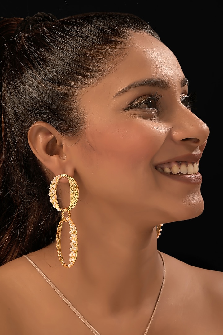Gold Finish Pearl Handcrafted Dangler Earrings by MEDOSO JEWELLERY at Pernia's Pop Up Shop