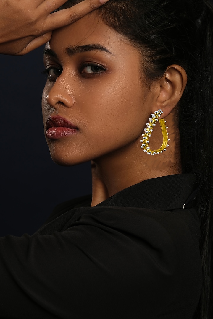 Gold Finish Pearl Handcrafted Hoop Earrings by MEDOSO JEWELLERY at Pernia's Pop Up Shop