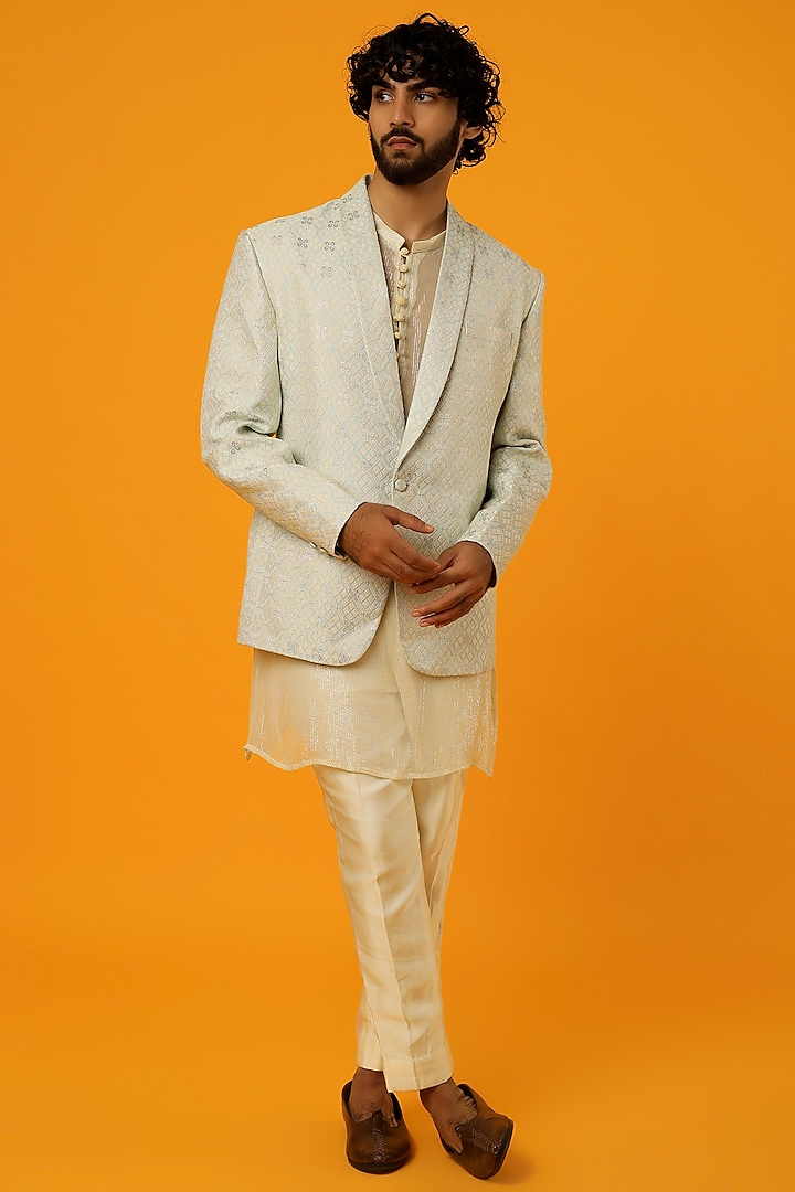 Off-White & Turquoise Banarasi Blazer Set by Megha Kapoor Label Men