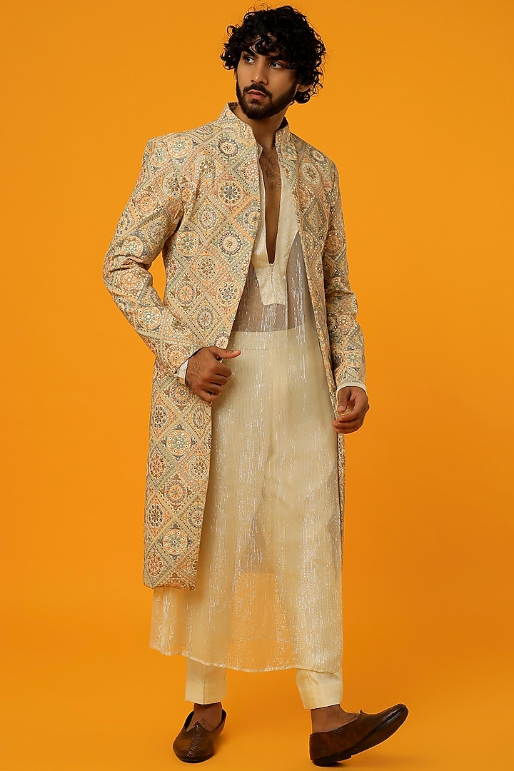 Pastel Beige Embroidered Sherwani Set by Megha Kapoor Label Men