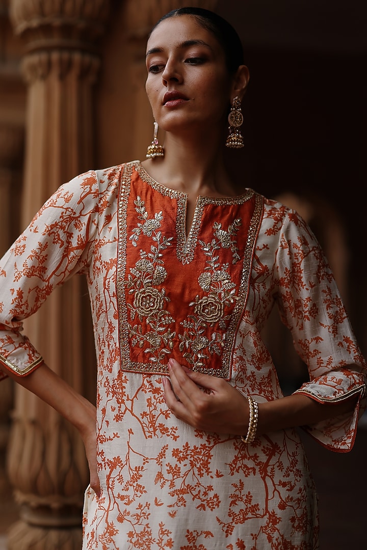 Off-White & Orange Dupion Silk Zardosi Embroidered Kurta Set by Megha Pitti at Pernia's Pop Up Shop