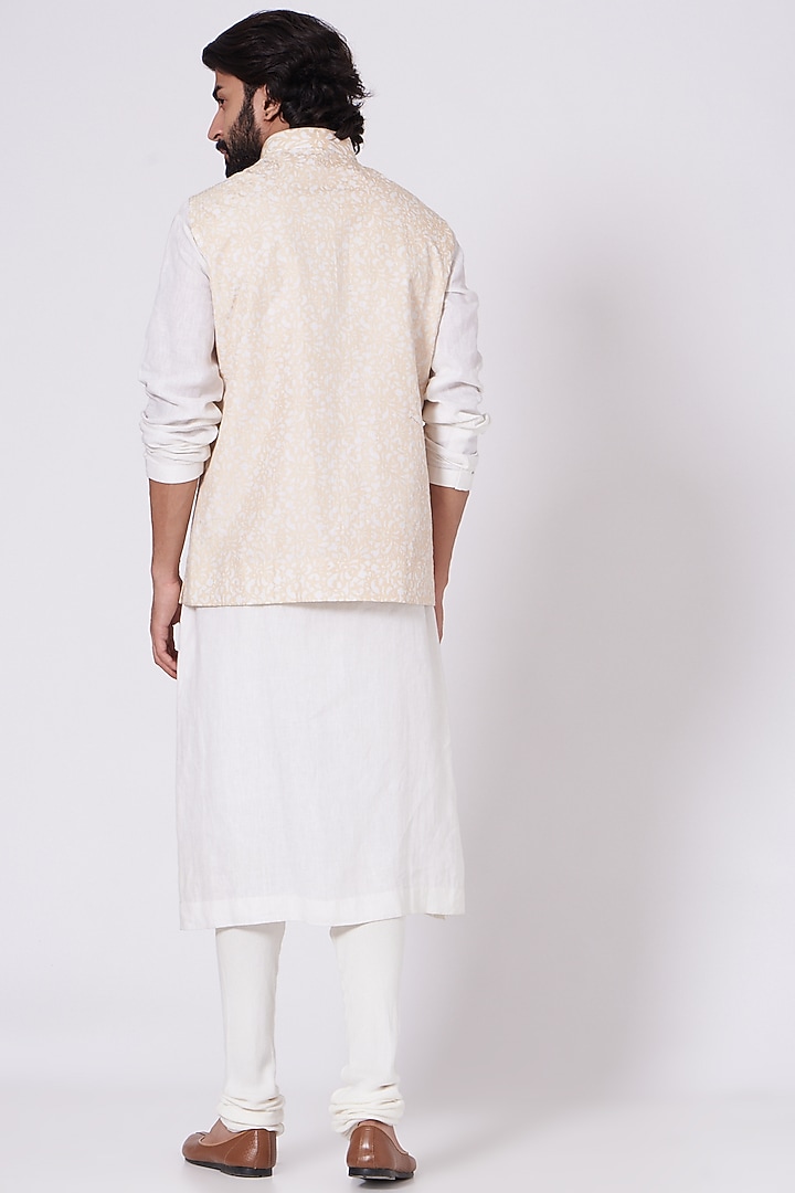 Ivory Kurta Set With Beige Bundi Jacket by Mehraab Men at Pernia's Pop Up Shop