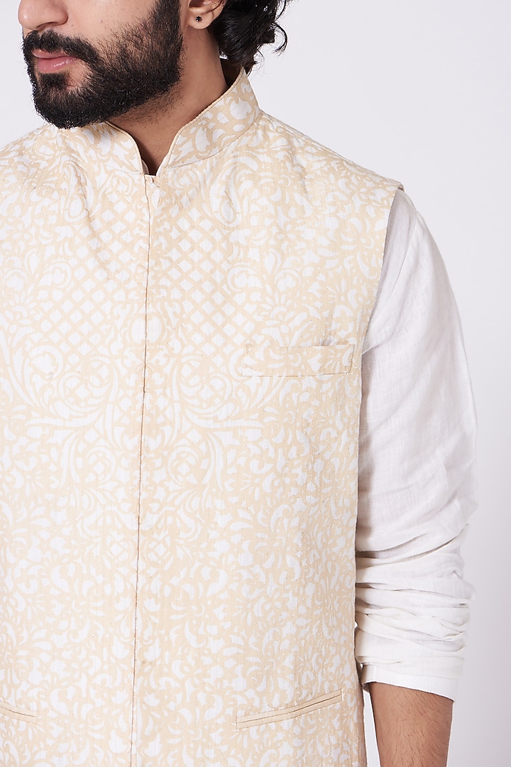 Ivory Kurta Set With Beige Bundi Jacket by Mehraab Men at Pernia's Pop Up Shop
