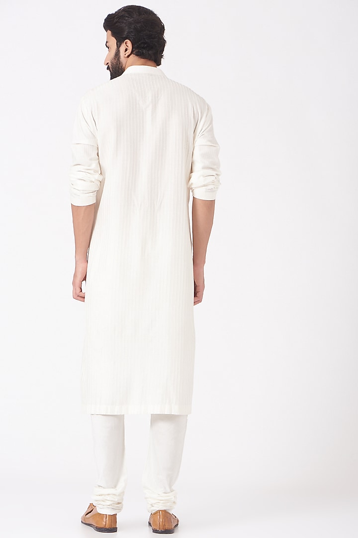 Off White Burfi Pintucked Kurta Set                 by Mehraab Men at Pernia's Pop Up Shop
