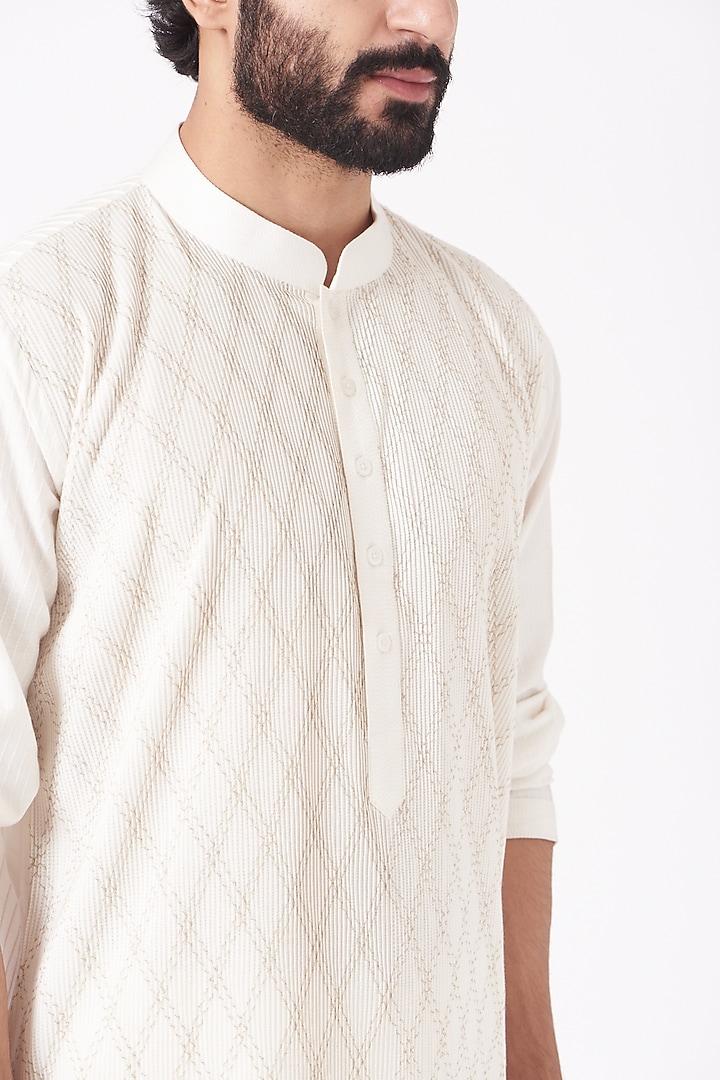 Off White Burfi Pintucked Kurta Set                 by Mehraab Men at Pernia's Pop Up Shop