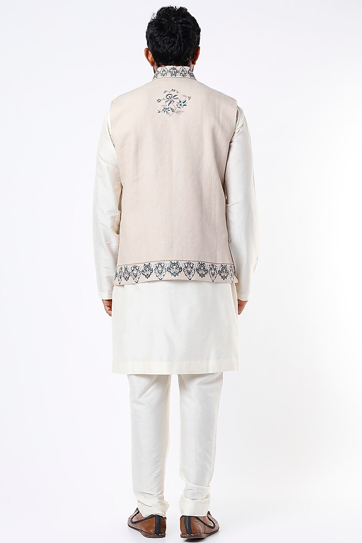 Ivory Linen Blend Jaal & Boota Work Bundi Jacket by Mehraab Men at Pernia's Pop Up Shop