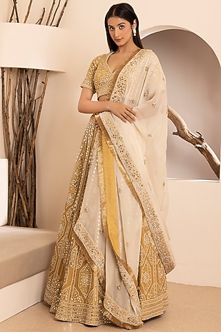 Golden Dupion Silk Embroidered Lehenga Set by MEHRAB