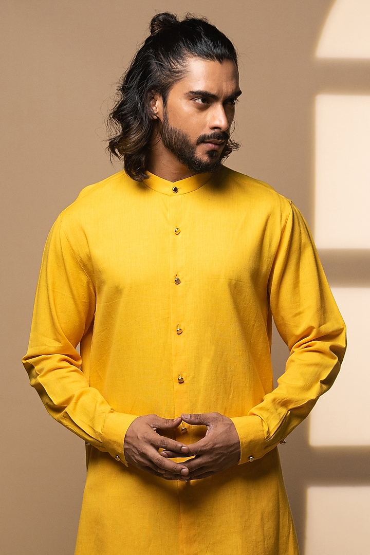 Yellow Khadi Asymmetrical Kurta Set by Medhavini Khaitan at Pernia's Pop Up Shop