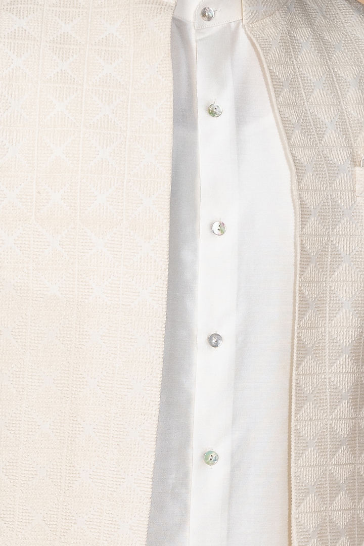 Ivory Muslin Embroidered Indowestern Jacket Set by Medhavini Khaitan at Pernia's Pop Up Shop