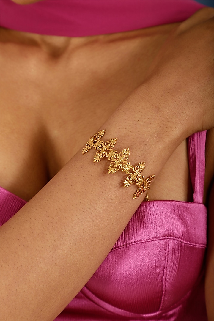 Gold Finish Floral Motif Bracelet by Melrosia