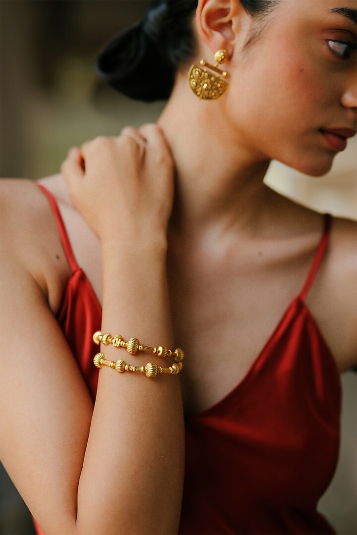 Gold Plated Textured Beaded Halo Bangles (Set Of 2) by Melrosia at Pernia's Pop Up Shop