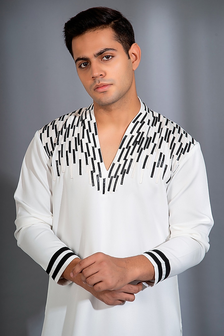White Crepe Lycra Machine Embroidered Kurta Set by Menero at Pernia's Pop Up Shop