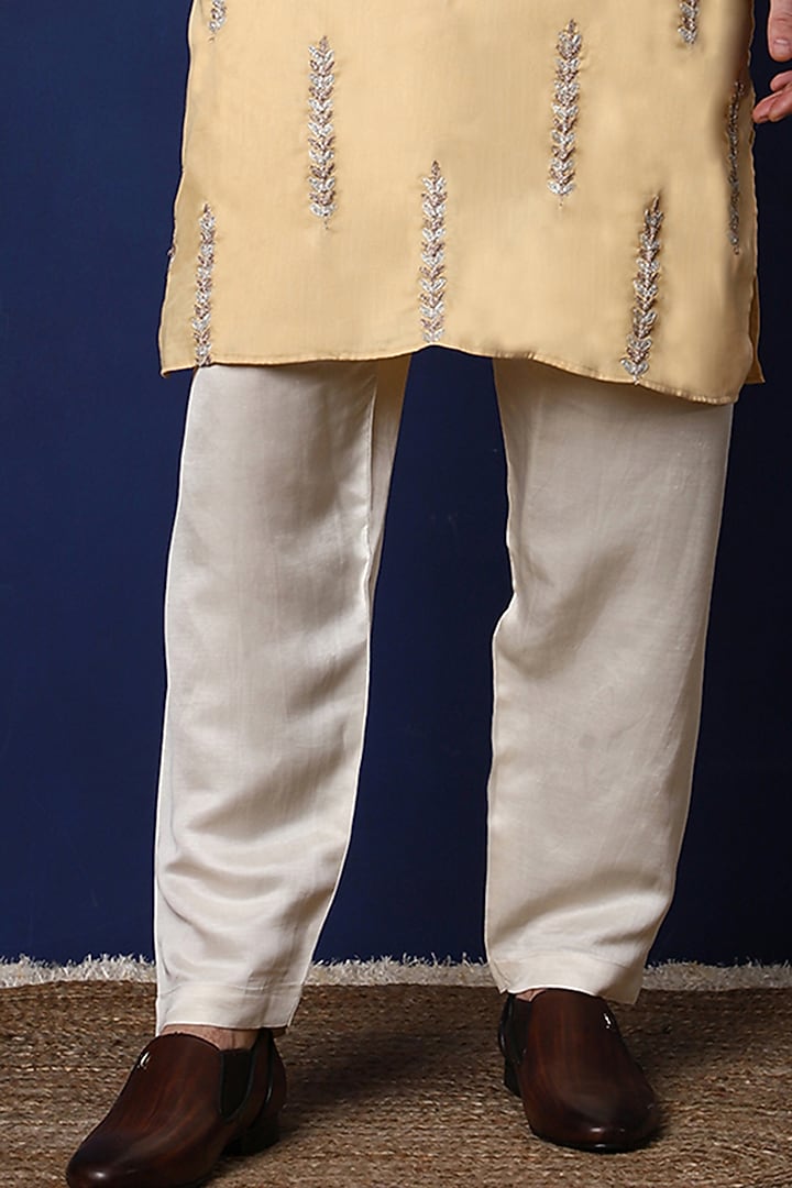 Dull Yellow Pure Cotton Floral Embroidered Kurta Set by Menero at Pernia's Pop Up Shop