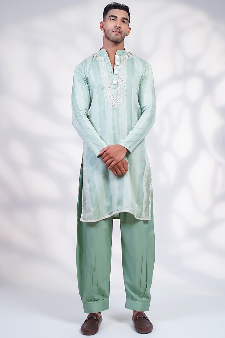 Green Cotton Silk & Pure Cotton Thread Hand Embroidered Kurta Set by Menero