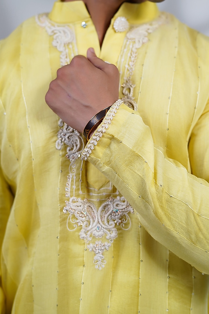 Yellow Cotton Silk & Pure Cotton Thread Hand Embroidered Kurta Set by Menero at Pernia's Pop Up Shop