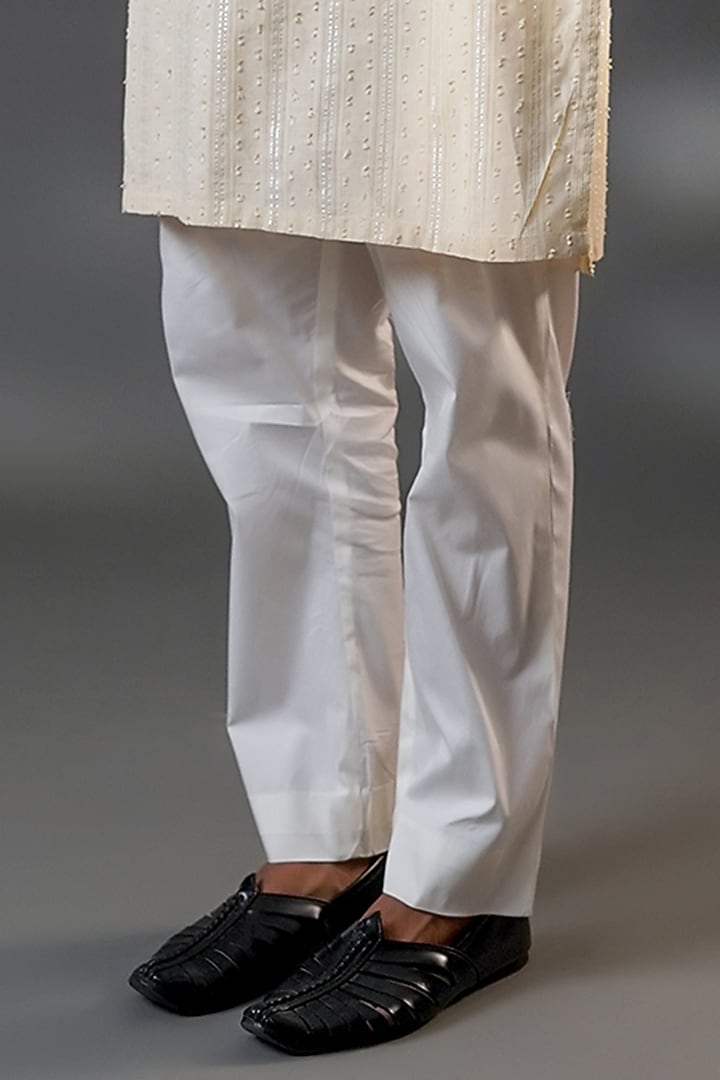 Light Cream Cotton & Net Machine Embroidered Straight Kurta Set by Menero at Pernia's Pop Up Shop