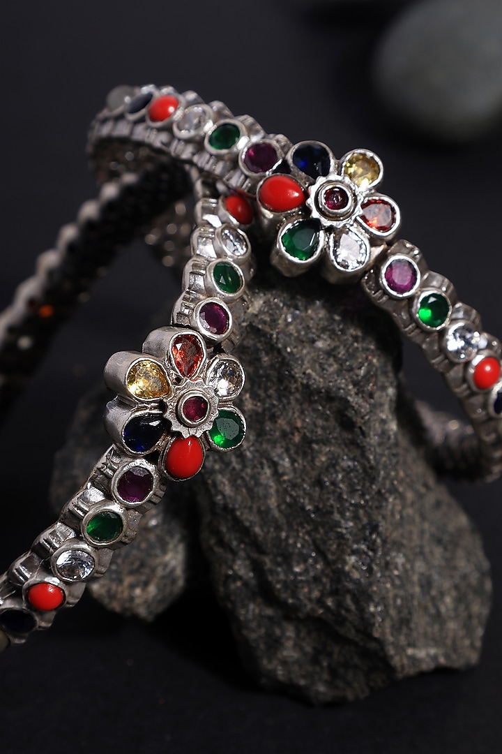 White Finish Navratna Stone Temple Bangles In Sterling Silver (Set Of 2) by Mero at Pernia's Pop Up Shop