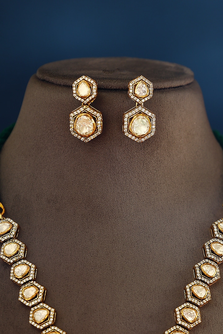 Gold Finish Moissanite & Emerald Temple Necklace Set In Sterling Silver by Mero at Pernia's Pop Up Shop