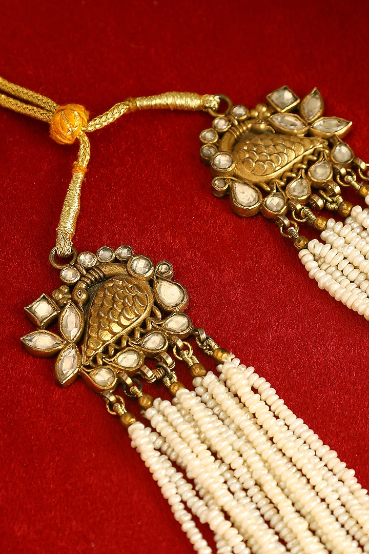 Gold Finish Kundan Polki Temple Necklace In Sterling Silver by Mero at Pernia's Pop Up Shop