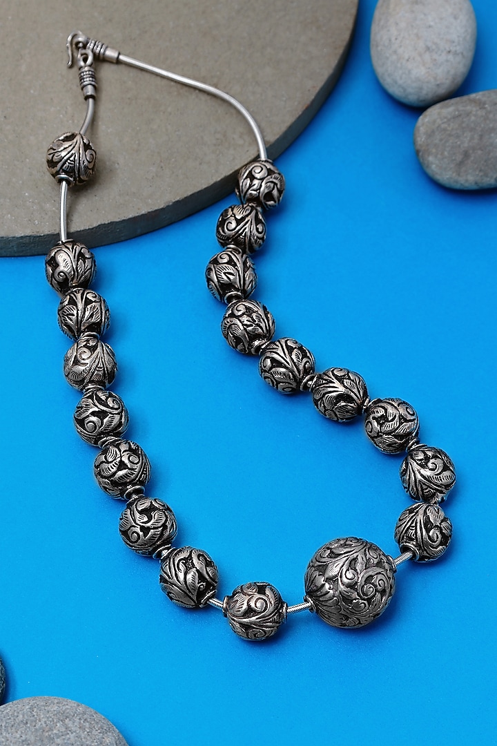 White Finish Chitai Beaded Long Temple Necklace In Sterling Silver by Mero at Pernia's Pop Up Shop