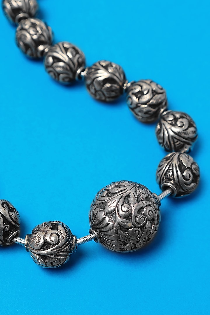 White Finish Chitai Beaded Long Temple Necklace In Sterling Silver by Mero at Pernia's Pop Up Shop