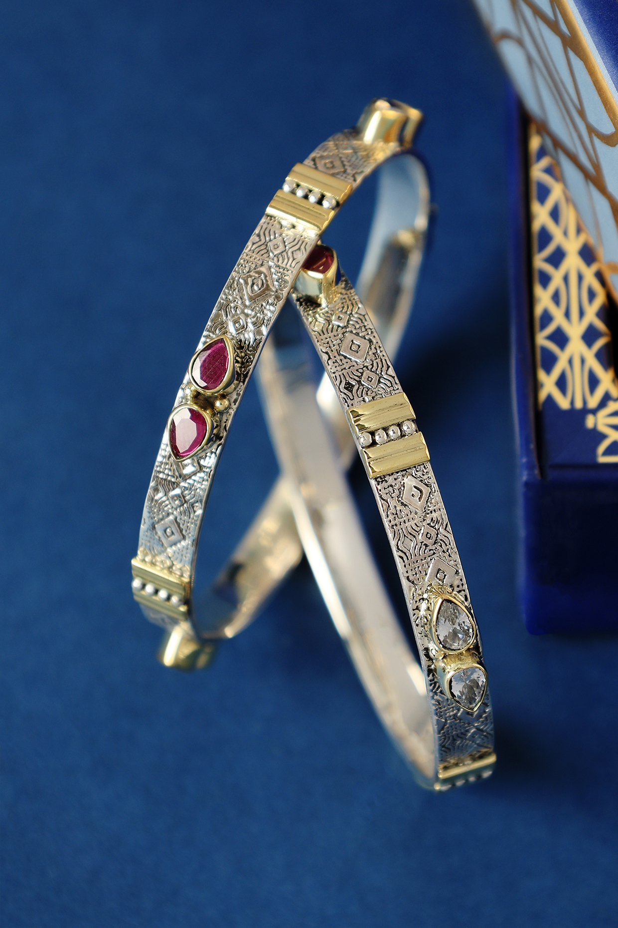 Two Tone Finish Ruby Onyx Temple Bangles In Sterling Silver (Set Of 2) by Mero at Pernia's Pop Up Shop