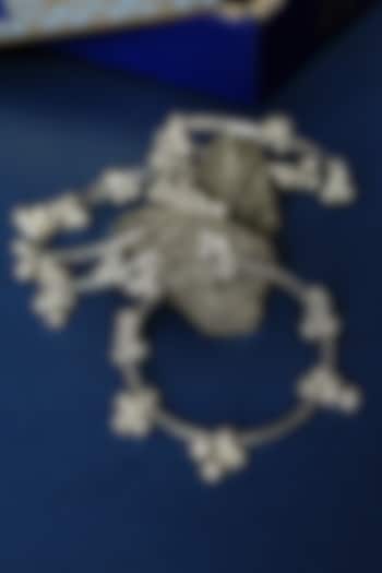 White Finish Ghungroo Temple Bangles In Sterling Silver (Set Of 4) by Mero at Pernia's Pop Up Shop