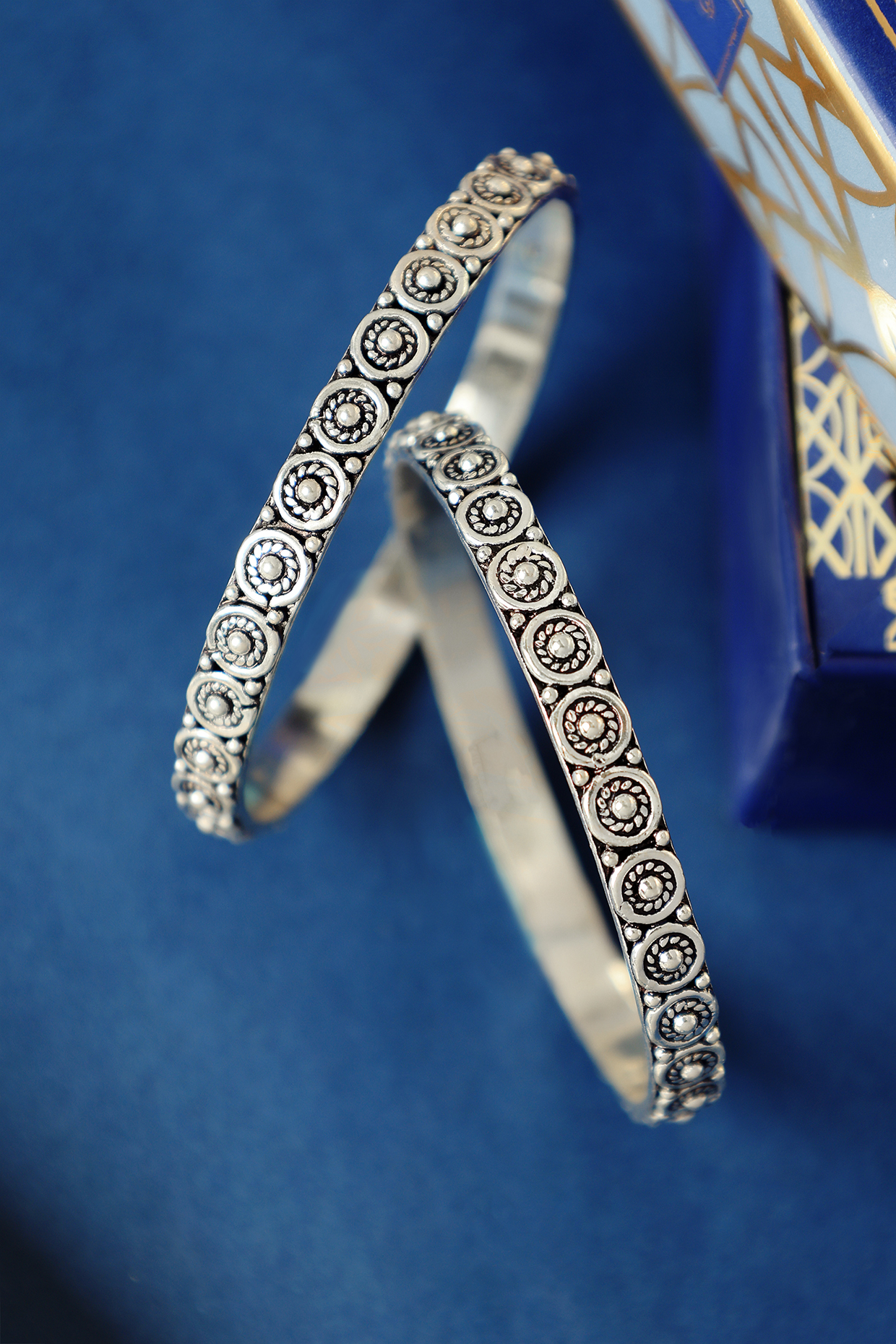 White Finish Temple Bangles In Sterling Silver (Set Of 2) by Mero at Pernia's Pop Up Shop