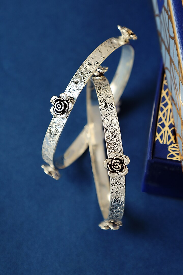 White Finish Temple Floral Bangles In Sterling Silver (Set Of 2) by Mero at Pernia's Pop Up Shop
