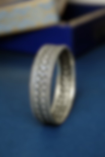 White Finish Temple Weaved Bangle In Sterling Silver by Mero at Pernia's Pop Up Shop