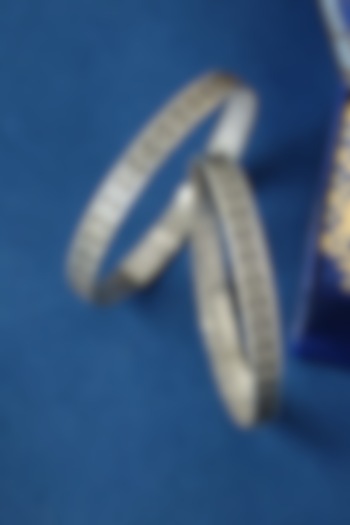 White Finish Temple Floral Bangles In Sterling Silver (Set Of 2) by Mero at Pernia's Pop Up Shop