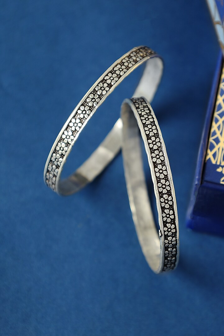 White Finish Temple Floral Bangles In Sterling Silver (Set Of 2) by Mero at Pernia's Pop Up Shop
