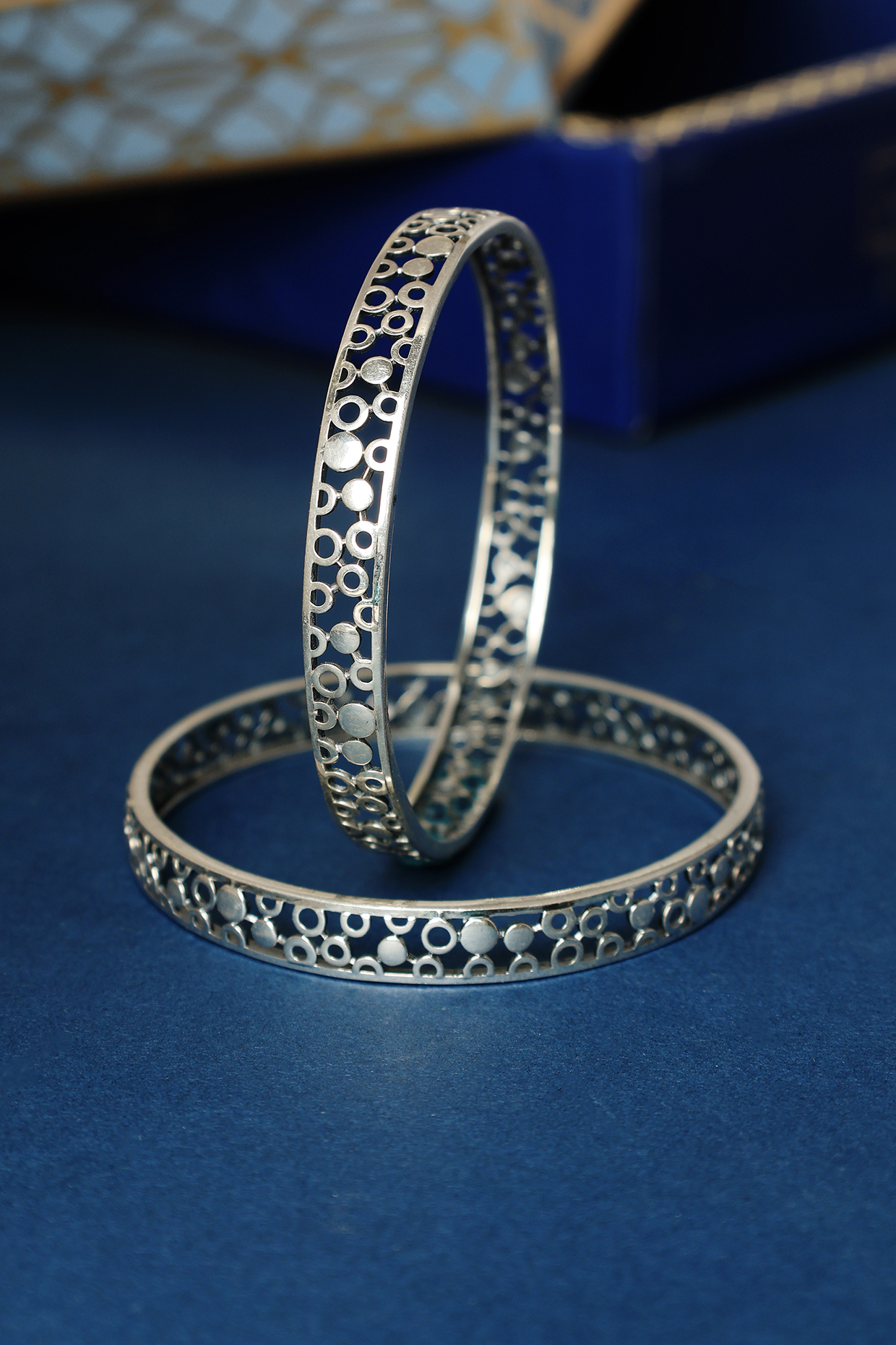 White Finish Temple Polka Bangles In Sterling Silver (Set Of 2) by Mero at Pernia's Pop Up Shop