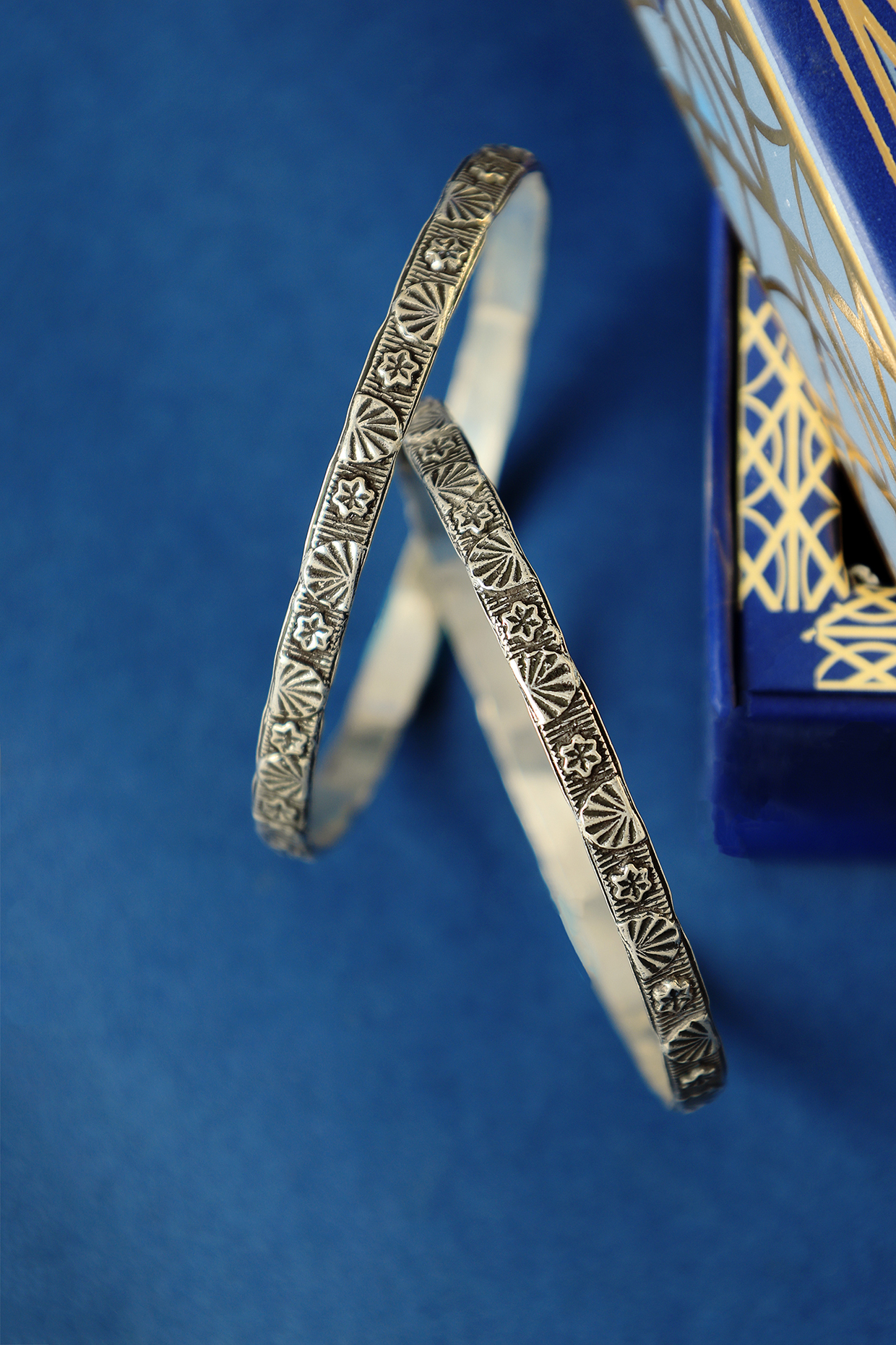 White Finish Temple Motif Bangles In Sterling Silver (Set Of 2) by Mero at Pernia's Pop Up Shop